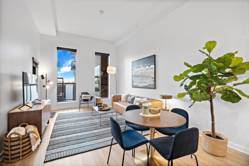 furnished living room and dining area in a Houston apartment home