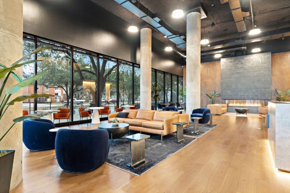 Forth at Navigation's lobby with seating and a modern fireplace